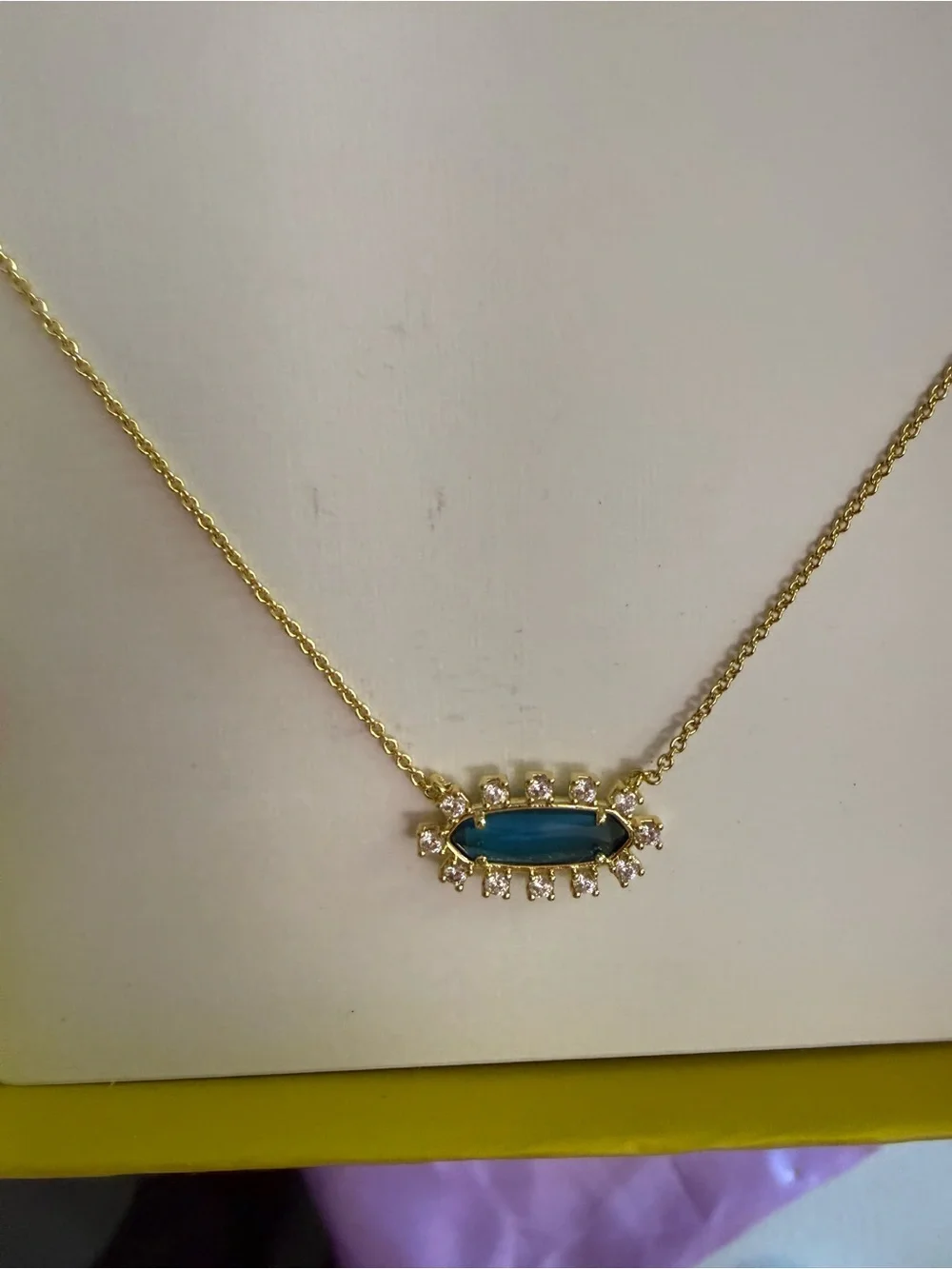 Kendra Scott Gold Necklace with Teal Oval Stone and Crystal Halo